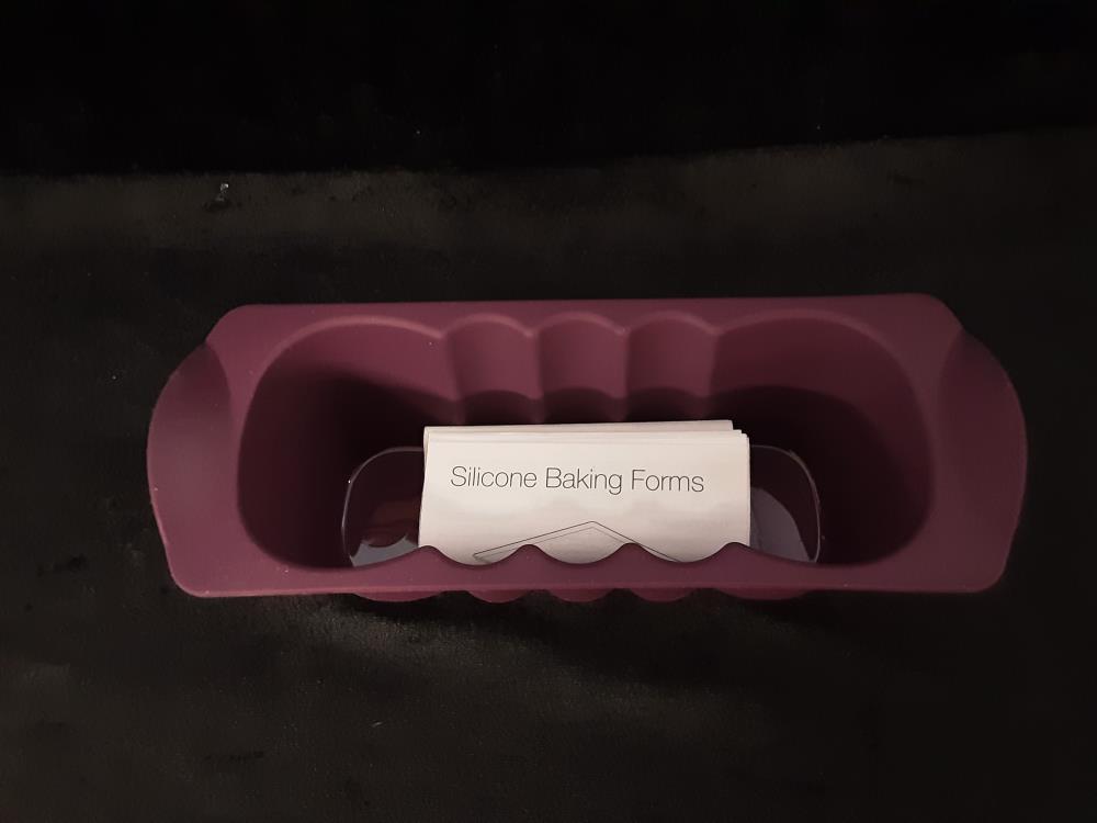 MOULE EN SILICONE CAKE L.22CM TUPPERWARE JAMAIS UTILISÉ