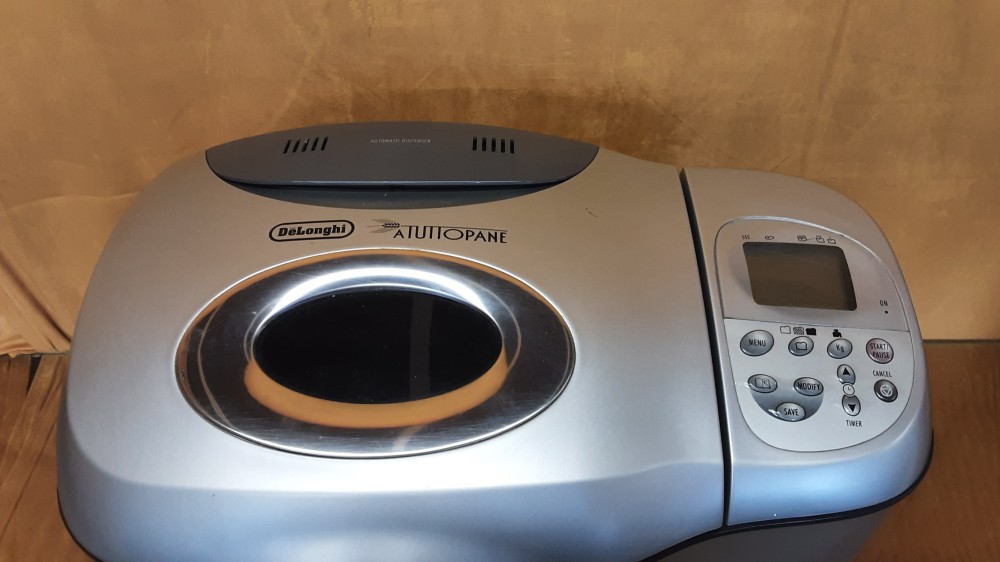 MACHINE A PAIN DELONGHI GRISE