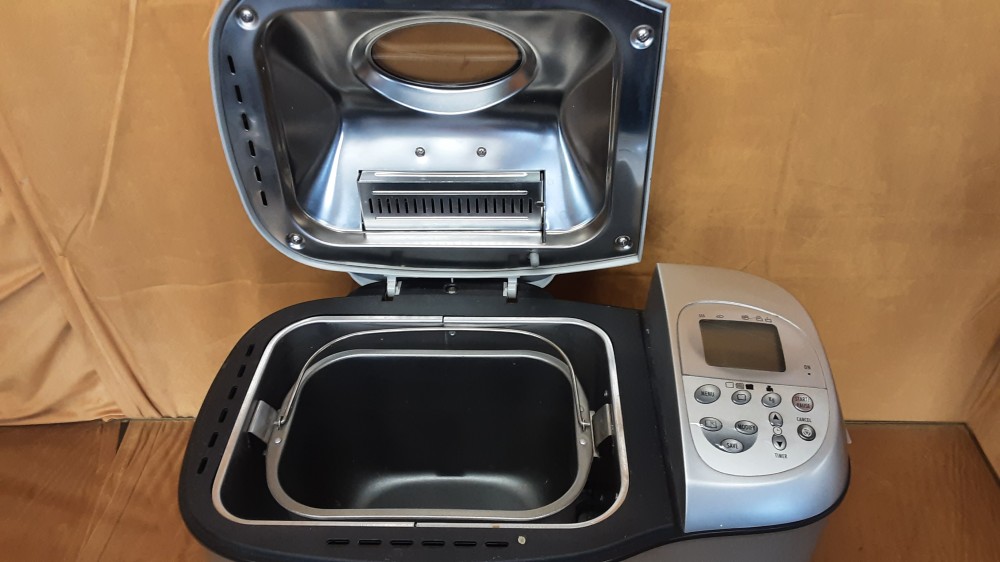 MACHINE A PAIN DELONGHI GRISE
