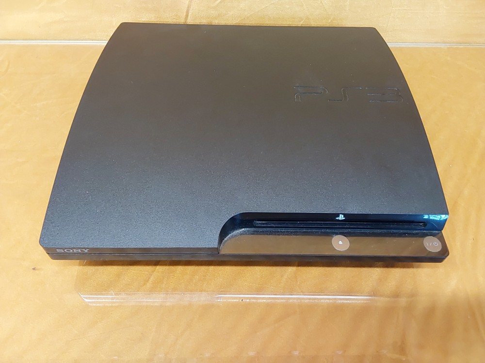 CONSOLE PS3 SLIM AVEC 1 MANETTE ET CABLES