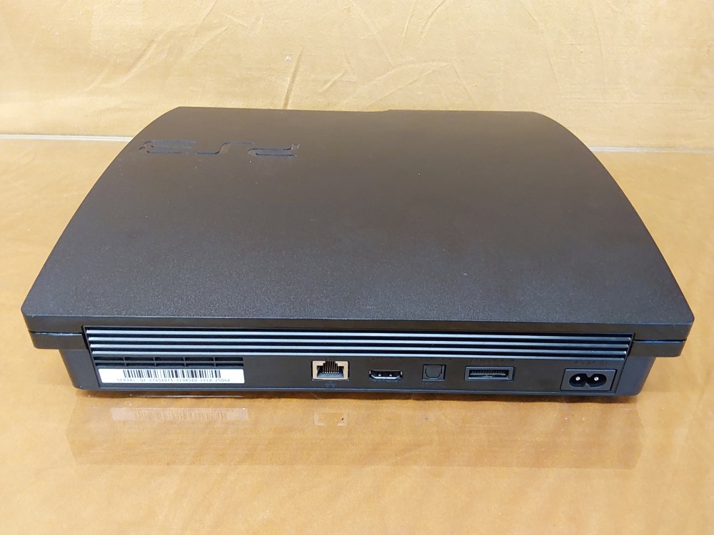 CONSOLE PS3 SLIM AVEC 1 MANETTE ET CABLES