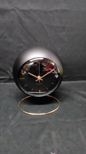 HORLOGE MODERNE NOIR ET DORÉE À POSER (8714302684685)