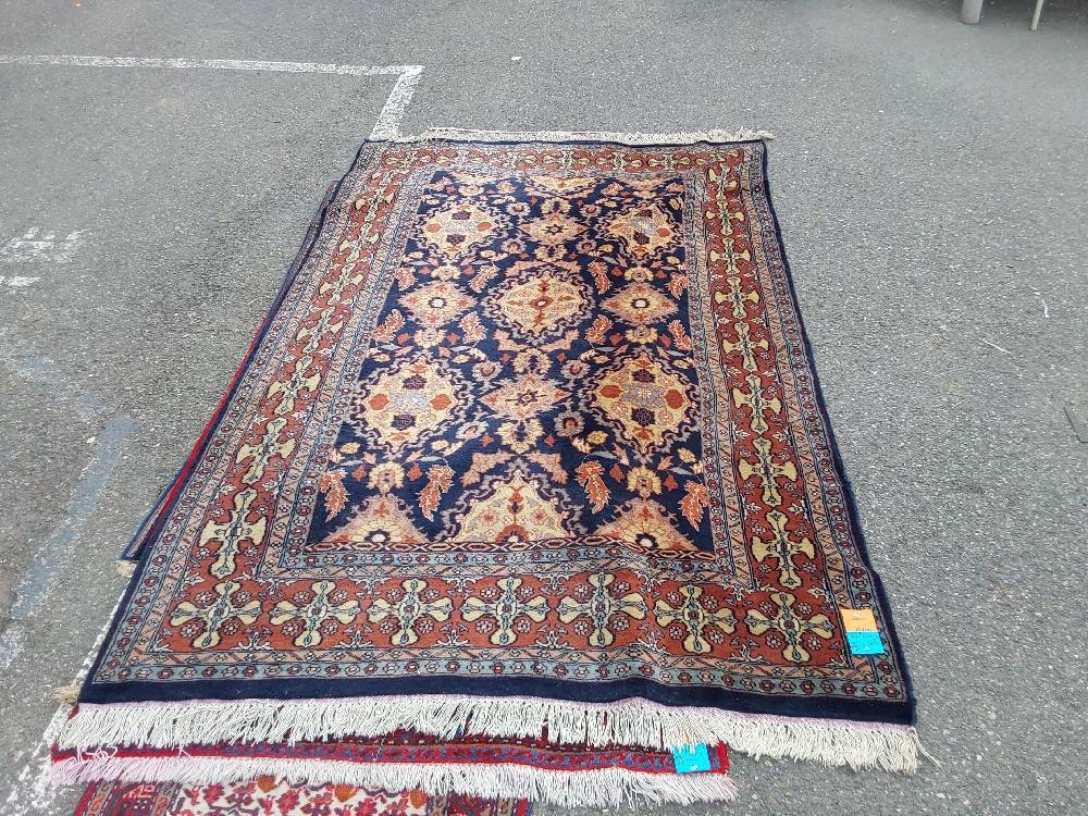 TAPIS 22 FAIT MAIN LAINE BLEU ET BRUN 