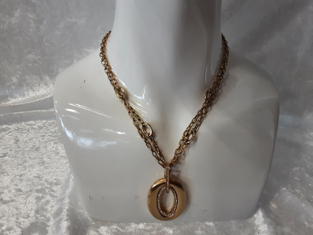 COLLIER ANNEAUX DORÉ ET STRASS