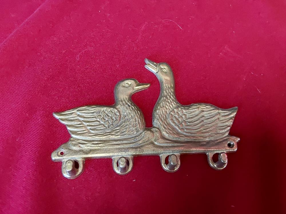 PORTE SERVIETTES CANARD EN LAITON 
