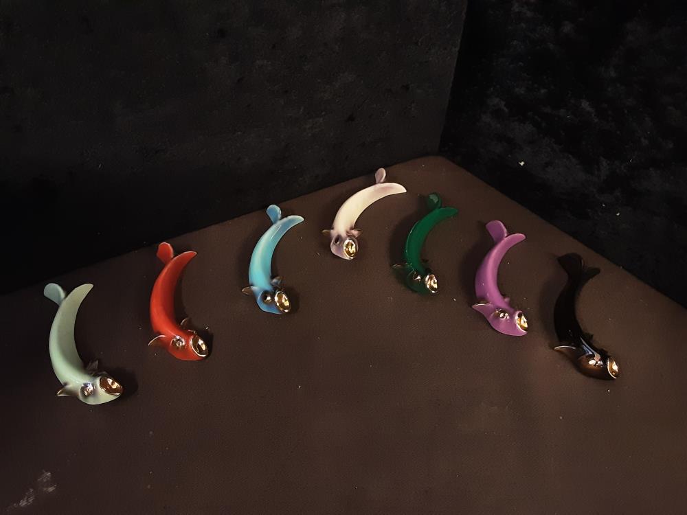 LOT DE 7 PORTES COUTEAUX POISSONS PORCELAINE