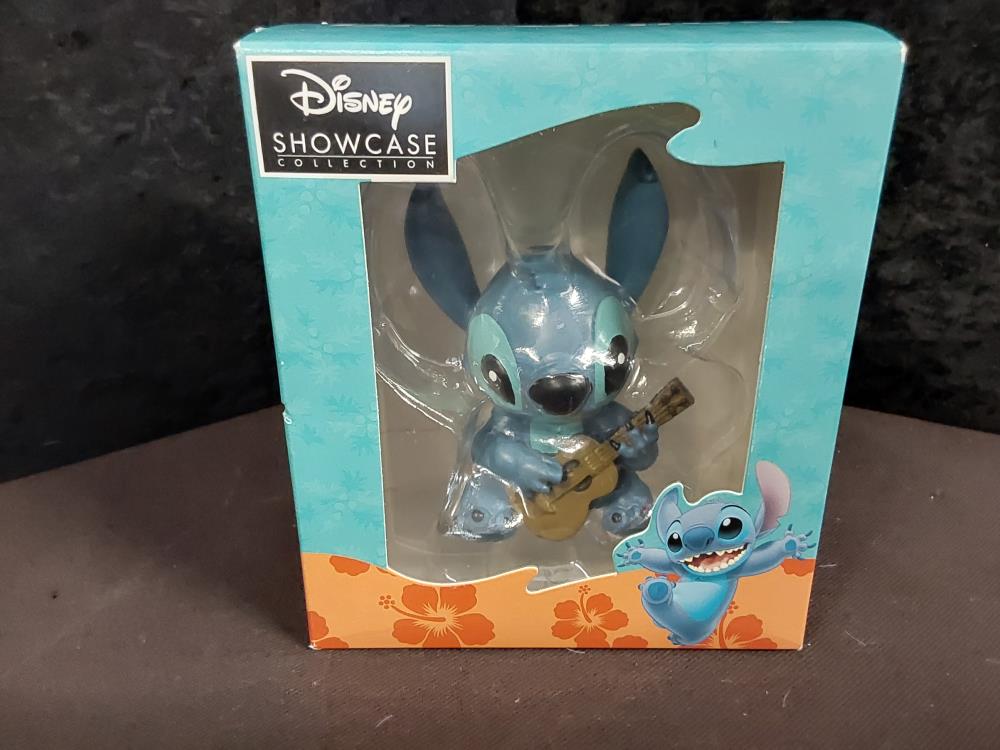 FIGURINE STITCH MISICIEN