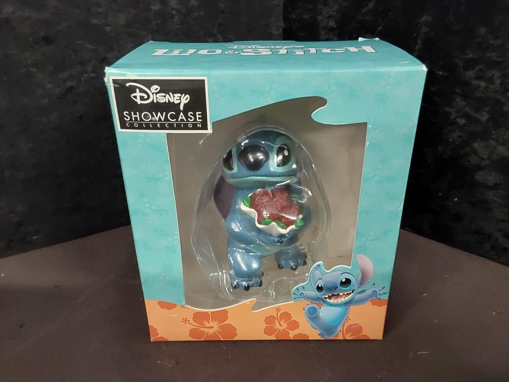 FIGURINE STITCH BOUQUET DE FLEURS