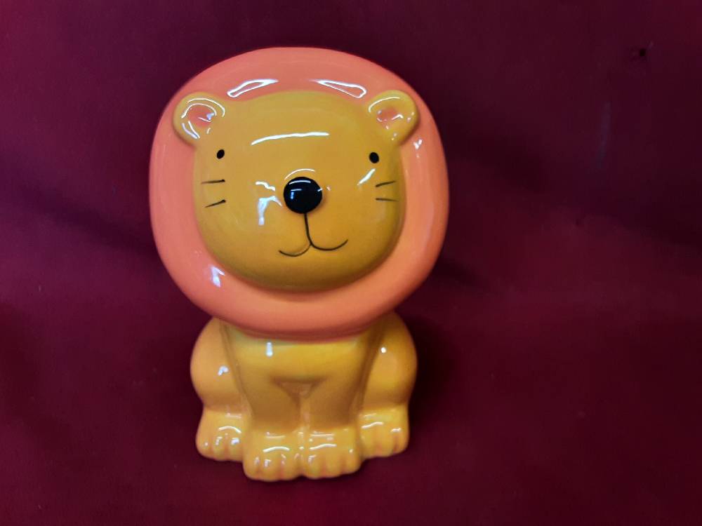 TIRELIRE LION 