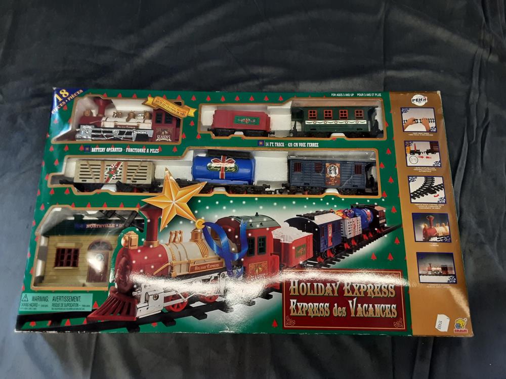 TRAIN A PILES HOLIDAY EXPRESS DANS SA BOITE