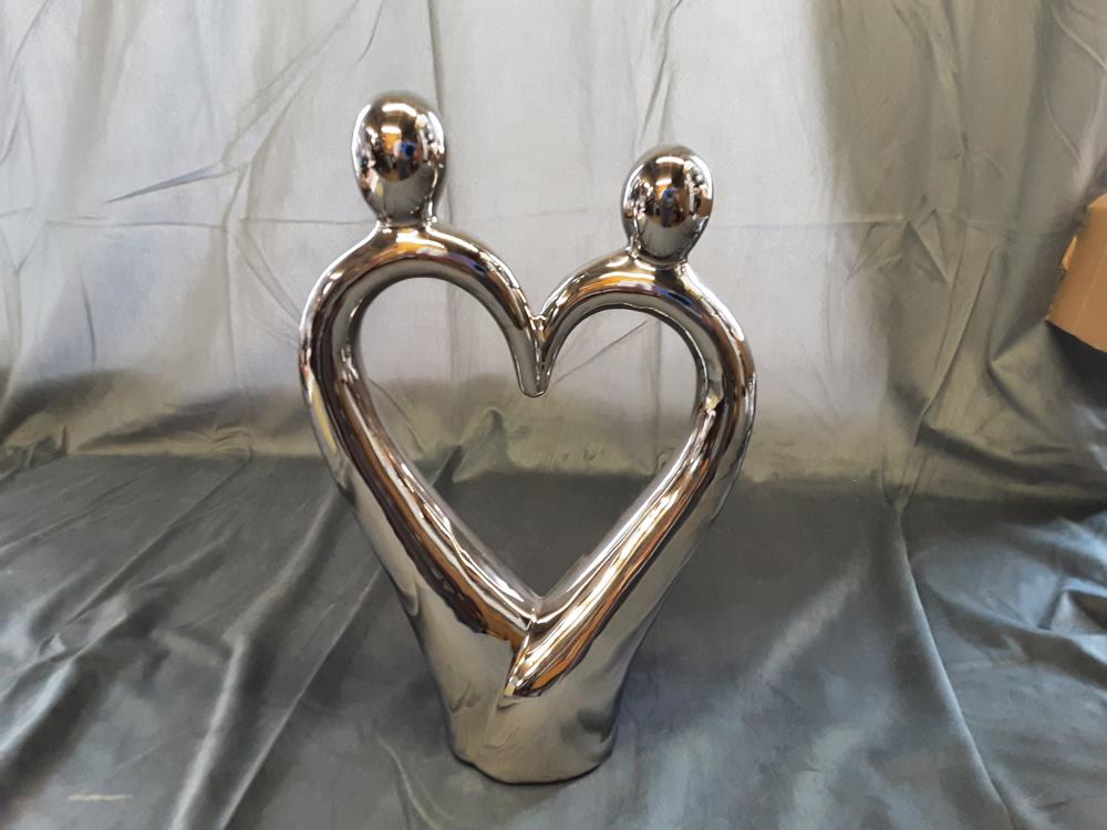 COUPLE FORME DE COEUR COLORIS ARGENTE 