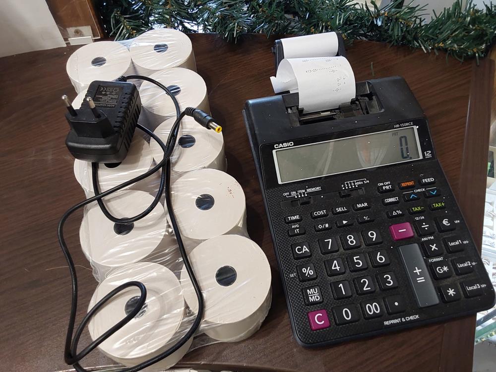 CALCULATRICE A TICKETS DE CAISSE  CASIO AVEC 10 ROULEUAX DE PAPIERS