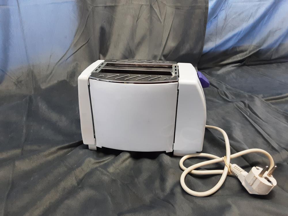 GRILL PAIN HOM TECH BLANC TEST OK