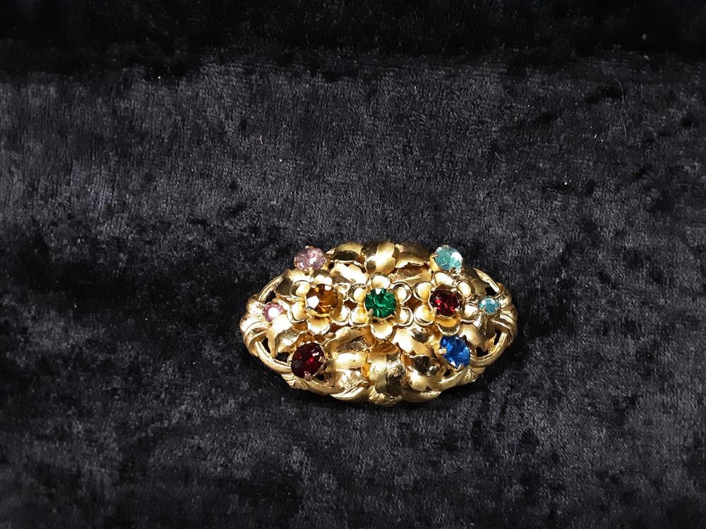BROCHE DORÉE OVALE AVEC STRASS MULTICOLORE