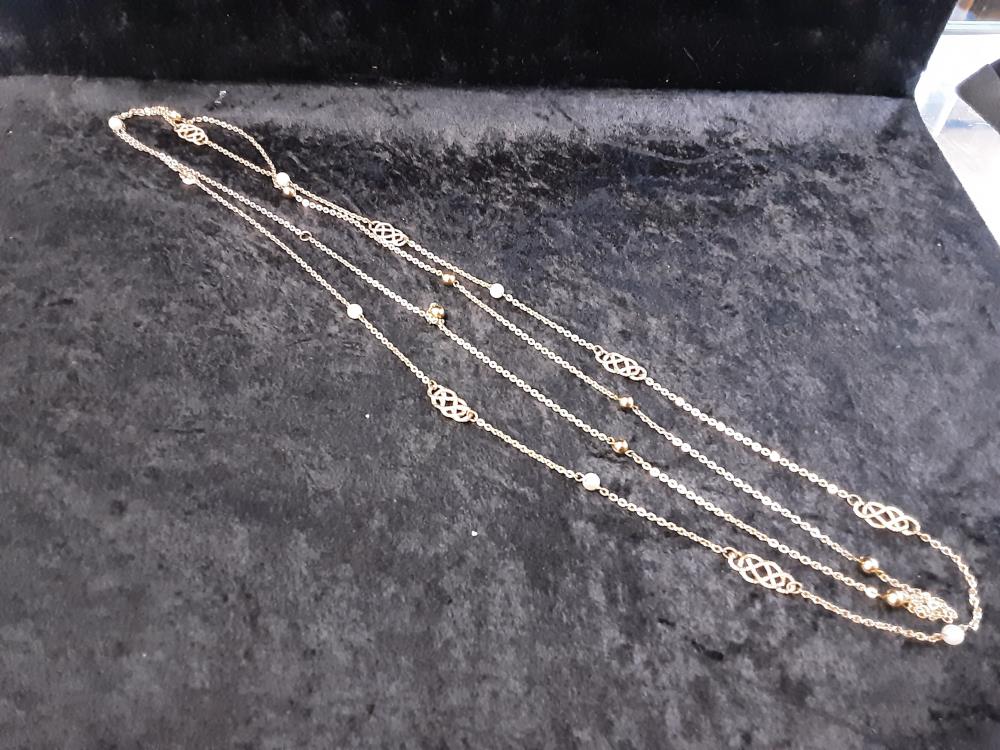 SAUTOIR DORÉ ET BOULES BLANCHES LONG 90CM