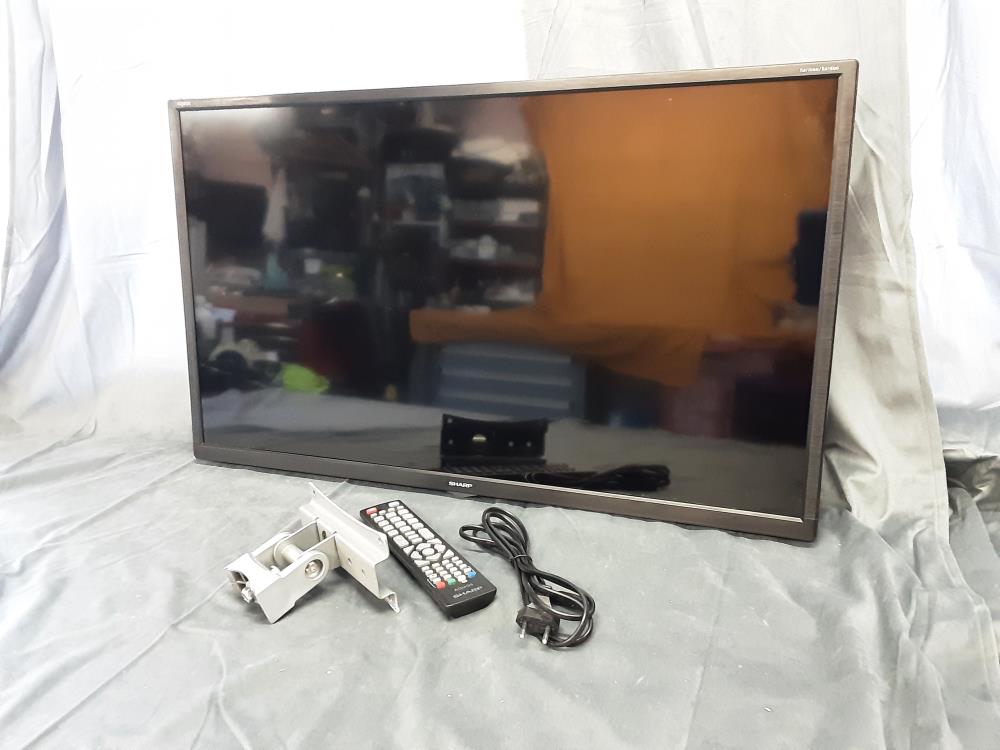 TELEVISION  SHARP 32POUCES AVEC SUPPORT  MURAL + TC