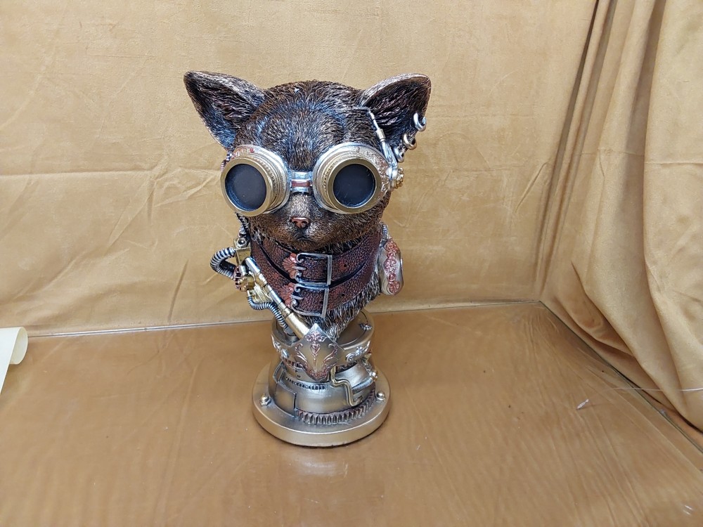 TETE DE CHAT AVIATEUR MECANIQUE EN RESINE À RESTAURER