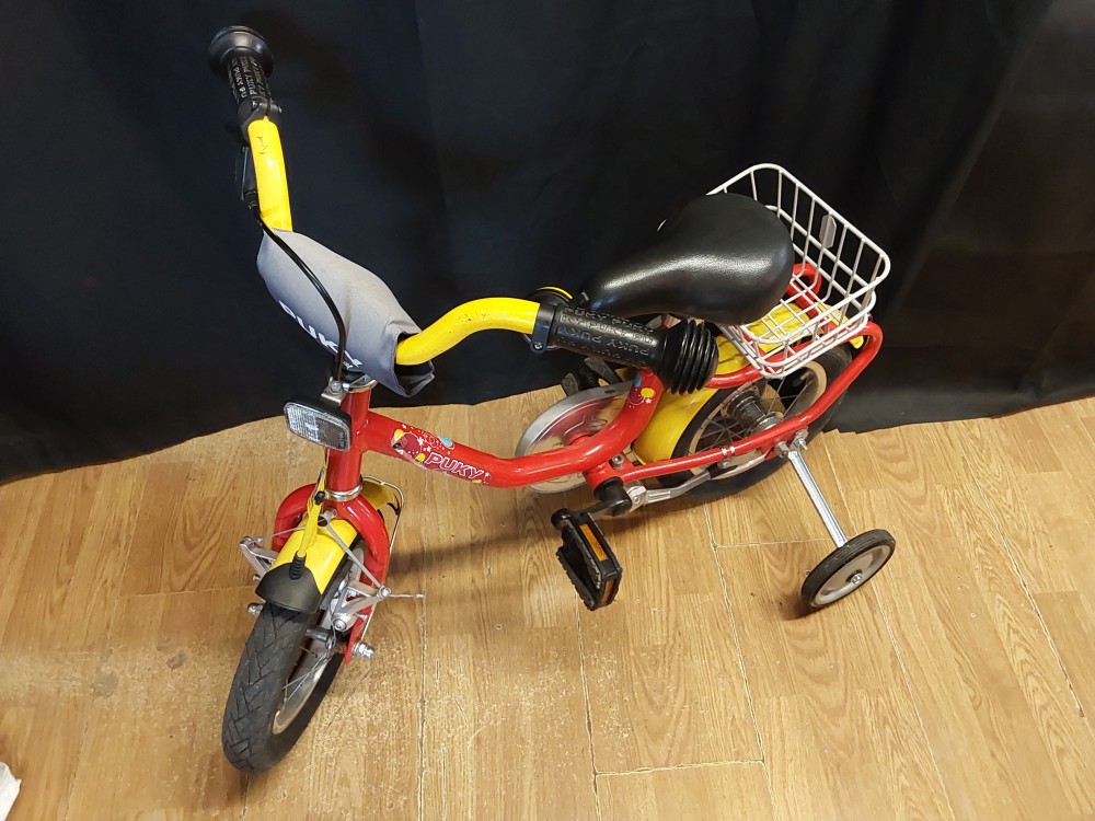 VELO ENFANT 12P AVEC ROULETTES ROUGE ET JAUNE PUKY