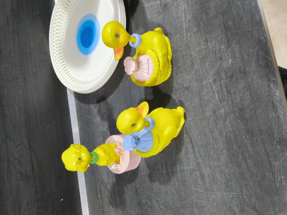 TIRELIRE CANARD JAUNE VINTAGE PVC