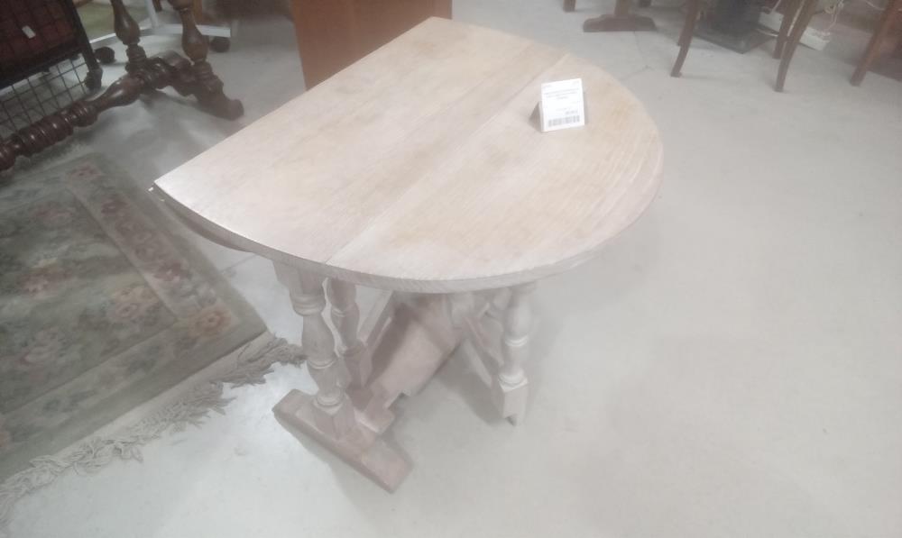 TABLE BASSE PORTEFEUILLE AVEC 2 ABATTANTS PIEDS TOURNES