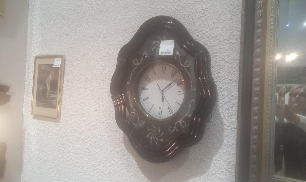 PENDULE OEIL DE BOEUF AVEC MOUVEMENT MODERNE A PILE