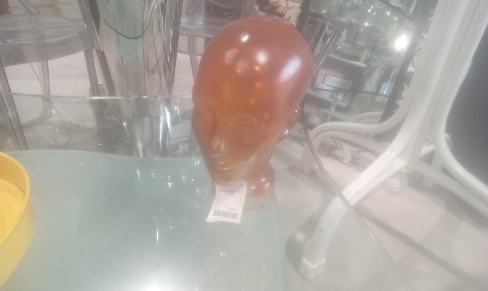 TETE ORANGE EN VERRE EN L'ETAT