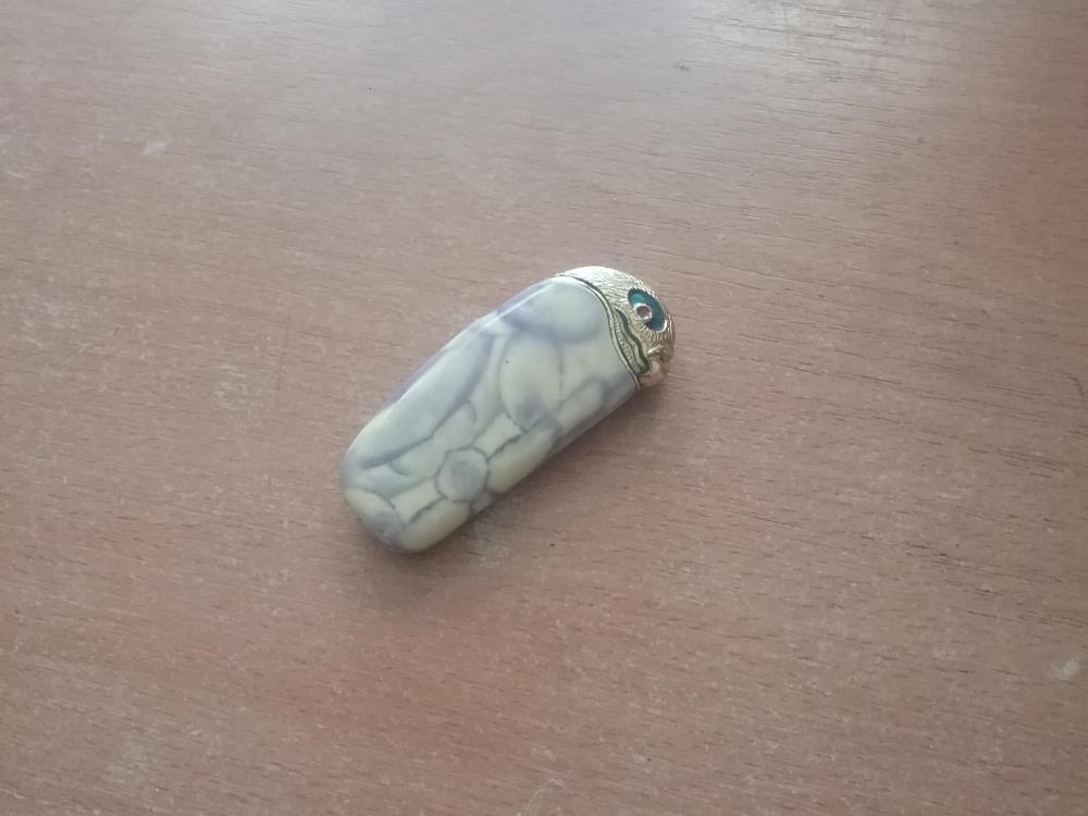BRIQUET TETE OISEAU