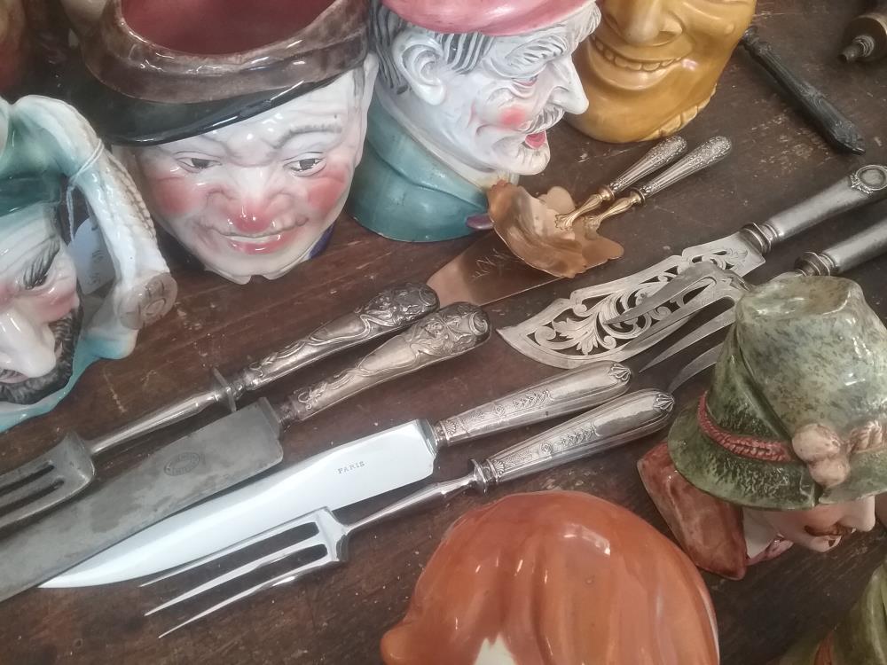 PAIRE DE COUVERTS ARGENT FOURRE