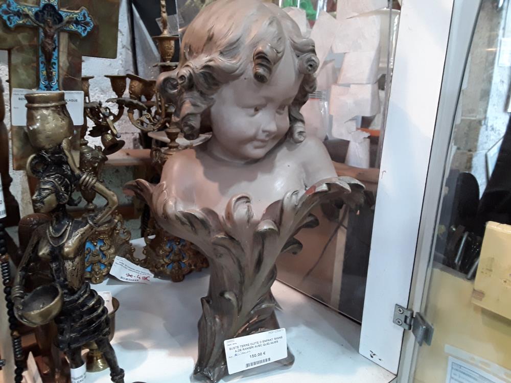 BUSTE TERRE CUITE D ENFANT SIGNE A.DE RANIERI AVEC QUELQUES ACCIDENTS