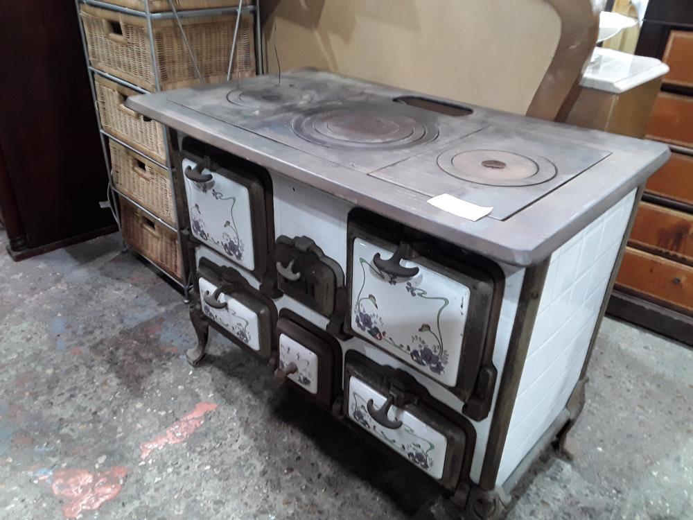 CUISINIERE FONTE ET EMAIL FOYAU LATERAL DANS L'ETAT