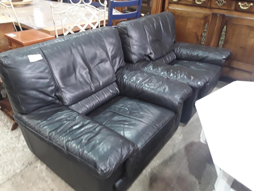 PAIRE DE FAUTEUILS CUIR NOIR ROCHE BOBOIS