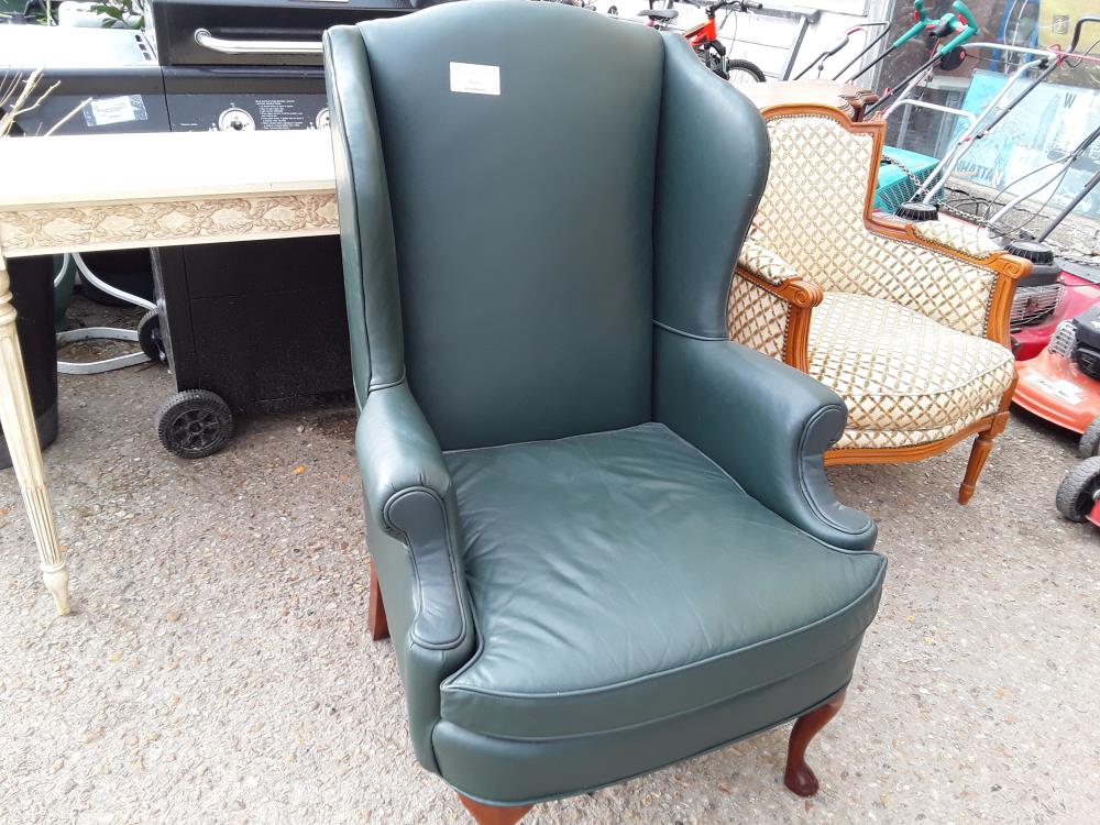FAUTEUIL A OREILLES CUIR VERT