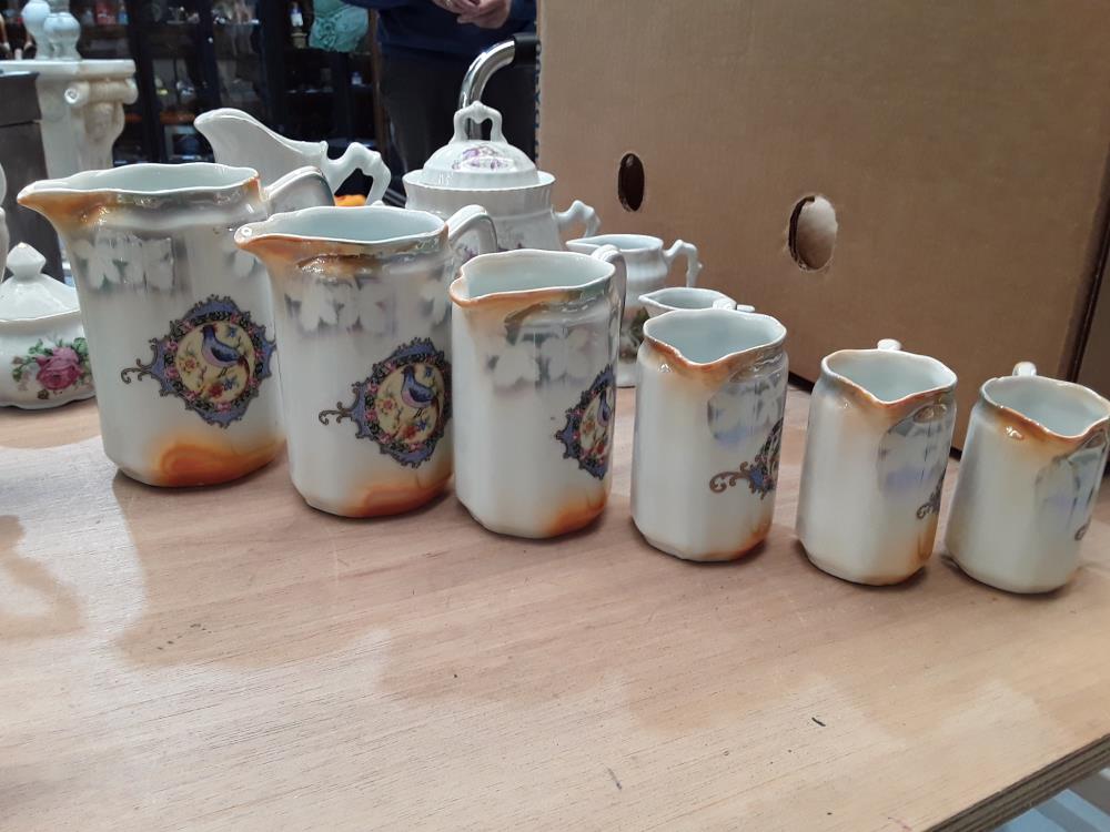 SERIE DE 6 POTS EN PORCELAINE OISEAUX 