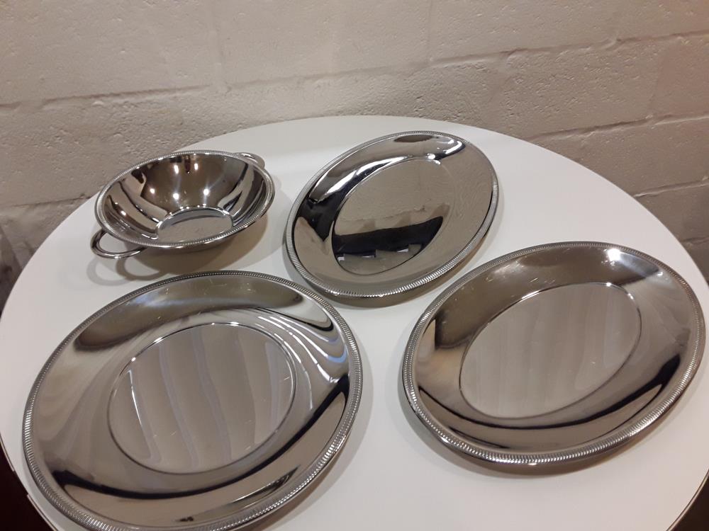 LOT DE 4 PLATS JEAN COUZON EN INOX