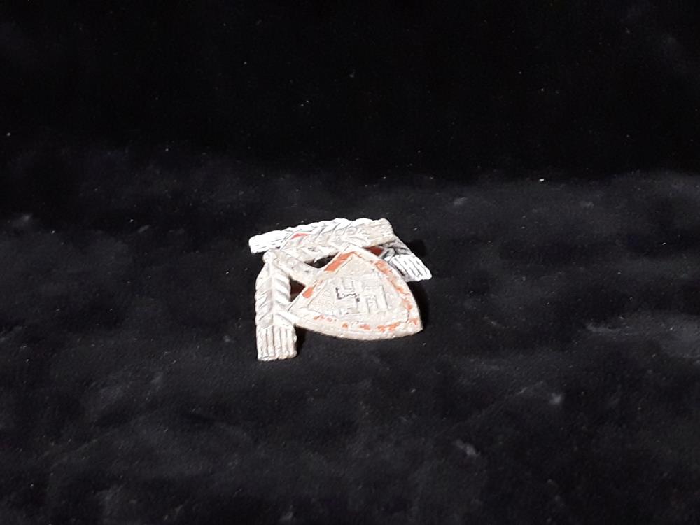 INSIGNE DE FOUILLE À L'UNITÉ 