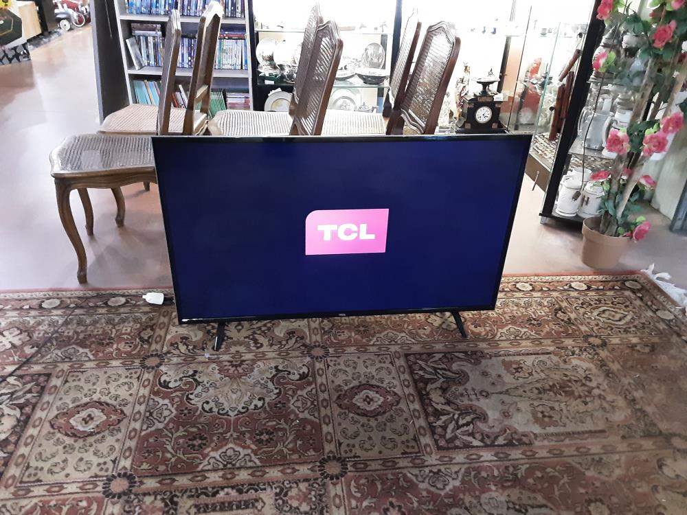 TELEVISION TCLU49P6006 + TEL