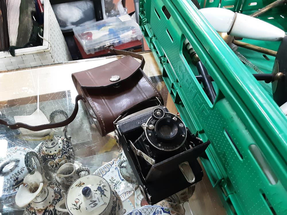 APPAREIL PHOTO A SOUFFLER