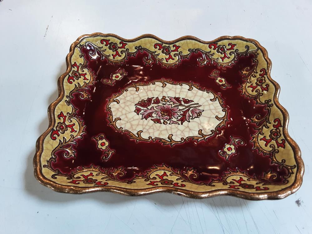 PLAT LONGWY ROUGE DORE (FENDU DERRIERE)