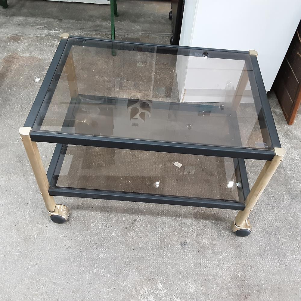 TABLE BASSE RECTANGLE VERRE A ROULETTES 